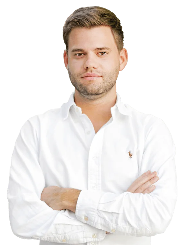 Person standing with laptop